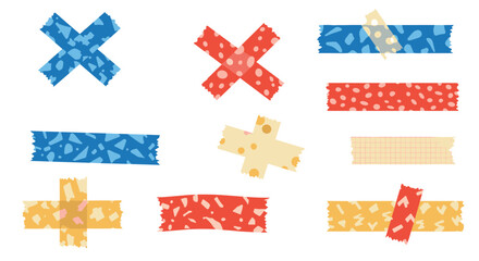 Obraz premium A vibrant collection of decorative tape pieces featuring various patterns and shapes, including crosses and strips, against a clean white backdrop.