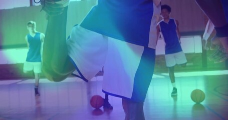 Male player holding stretch releasing and stepping as basketball drill starting and balls rolling - Powered by Adobe