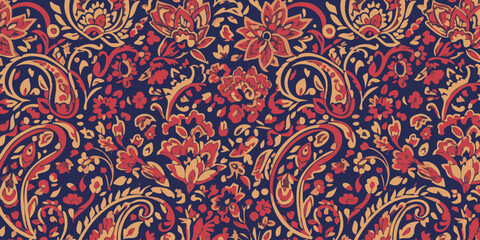 Detailed paisley seamless pattern design with vibrant red and golden floral motifs on navy blue background