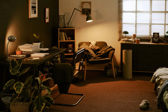 No people shot of cozy room interior with cluttered home office desk