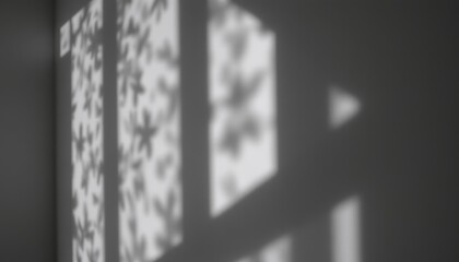 Intricate Shadow Patterns Created by Natural Light on a Wall in a Modern Indoor Space