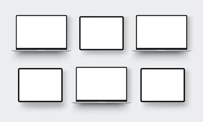 Laptops and tablets with blank screens. Mockups for showcasing website designs, UI concepts and app interfaces