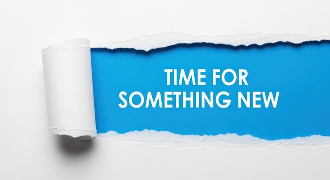 A white sheet of paper is torn to reveal the words time for something new in blue, suggesting a fresh start, change, or opportunity, isolated on white background