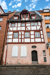 Traditional timber-frame house in the historic old town of Nuremberg, Germany, with classic medieval architecture and a detailed facade