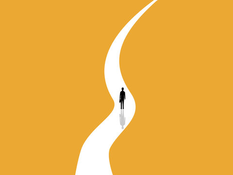 businessman in the middle of a winding road