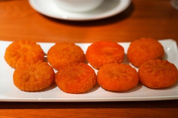 Nan gua bing small pumpkin cakes. Cantonese cuisine in Guangzhou.