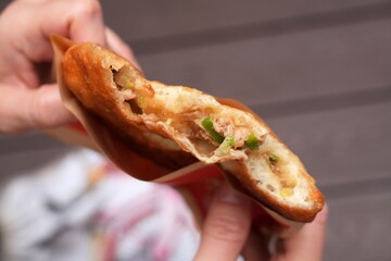 Tujia meat pie - xian bing. Street food of regional Chinese cuisine in Shenzhen.
