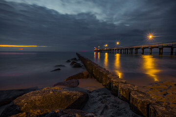 Fototapeta premium Pier in the evening after sunset in the Baltic Sea