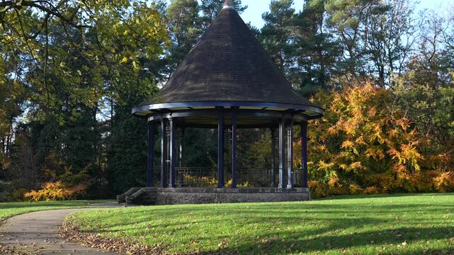 Historic Victorian bandstand in Leek Brough Park, peaceful British countryside