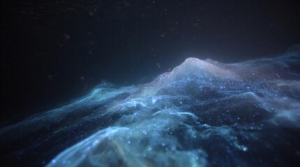 Underwater scene with a dark background. in the center of the image, there is a large wave that appears to be moving towards the right side of the frame.