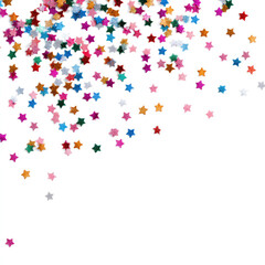 Festive confetti stars scattered on white background for celebration and design projects
