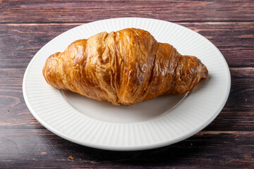 Fresh Croissant on White Plate