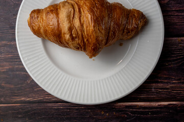Fresh Croissant on White Plate