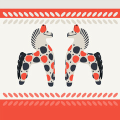 Two cows stand opposite each other. Dymkovsky toy