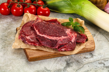 Raw beef cheeks cut for cooking
