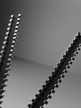 Zippers in Silhouette: Two parallel zippers in stark silhouette, meticulously detailed against a graduated backdrop, creating an abstract and intriguing visual texture.