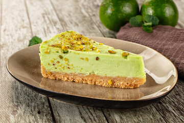 Green pistachio cheesecake served mint