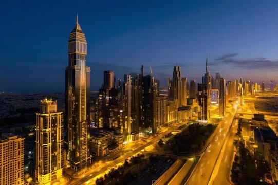 Cityscape at Twilight: A panoramic view of a bustling city skyline shimmering under the soft glow of twilight, a beacon of urban elegance and architectural brilliance.