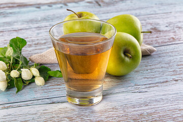 Apple yellow juice in the glass