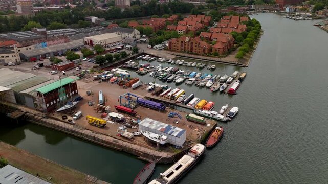 Bristol UK: 28th July 2025: View of boats in marina and river Avon near Bristol, showcasing activity on the water and nearby buildings