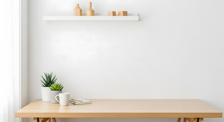 Minimalist desk setup with plants and decorative objects