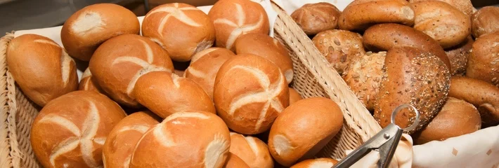 Fotobehang Brood Bakery baskets offering fresh baked bread rolls  © insideportugal