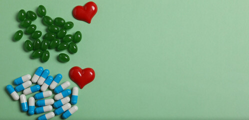 Pills in blister packs on a color background, banner
