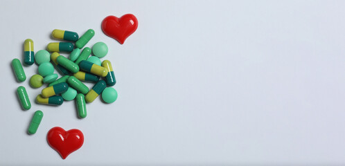 Pills in blister packs on a color background, banner
