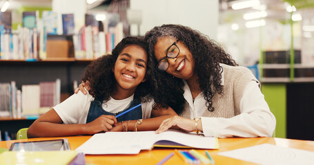 Tutor, portrait or child in library with hug, teaching or comfort in learning aid. Education, happiness and mature mentor at table with embrace, support and guidance for academic development.