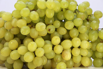 Close Up Studio Shot Of A Ripe Cluster Of White Grapes. A Juicy And Healthy Snack Concept Perfect For Grocery Or Diet Designs.