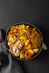 This balanced breakfast showcases baked sweet potato with carrots and zucchini, flavorful carrot and lentil cutlets, chicken breast