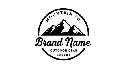 A vintage black and white circular logo for an outdoor gear company featuring a mountain range.