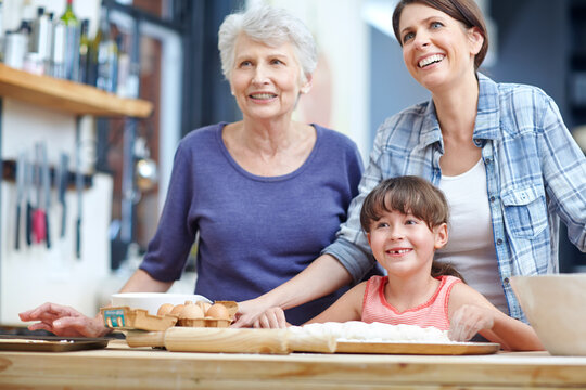 Happy mom, baker and generation with family recipe in kitchen for learning or development together. Mother, grandma and baking with smile, child or kid for dough, dessert or fun childhood in home - Powered by Adobe