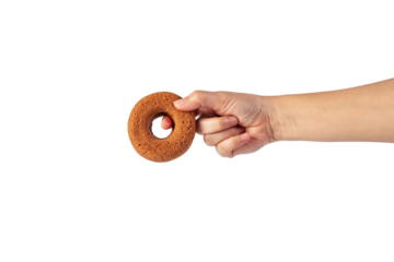 Chocolate round donut in hand on transparent background