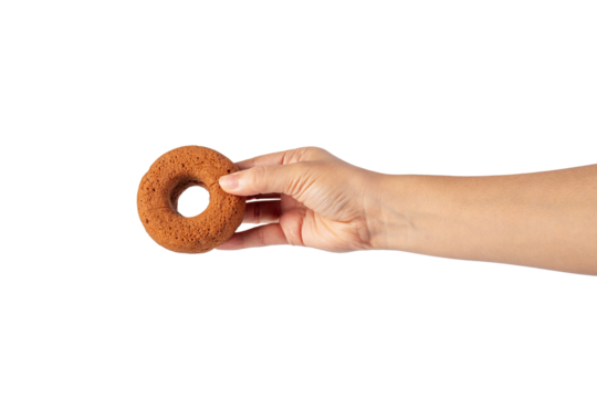 Chocolate round donut in hand on transparent background
