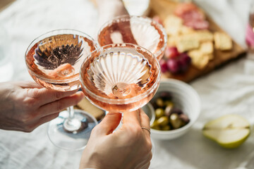 Glasses of rose wine seen during a dinner party of a celebration.