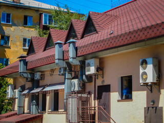 Cafe building from the back. Conditioners. Modern cafe building. Soviet apartment building. Ust-Kamenogorsk (kazakhstan)
