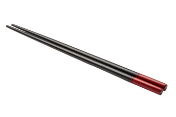 Pair of dark grey chopsticks with red accents on black background image