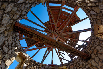 Old windmill at Agios Ioannis beach, Lefkada, Greece. Ruin of an old windmill.