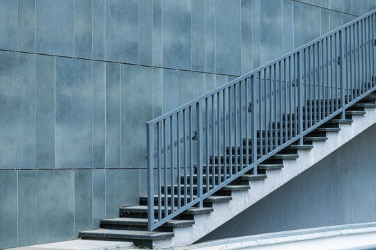 indoor space of empty design hall with cold tile wall background and stairway construction urban environment place minimalism style