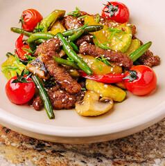 Delicious stir-fried vegetables and meat served in a warm bowl