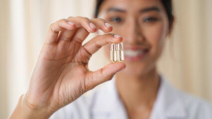 Person holding glp-1 capsules, showcasing supplements in a clinic setting for health and wellness promotions. diabetes treatment and drug innovation, weight loss