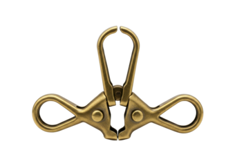 Isolated vintage brass metal clip fastener for DIY craft and handmade accessories project