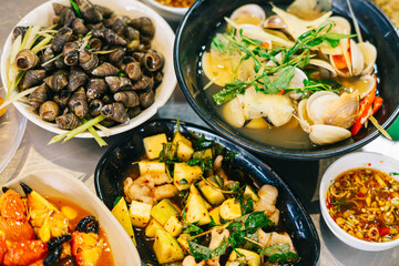 Delicious Asian seafood dishes with fresh ingredients served in a vibrant restaurant setting