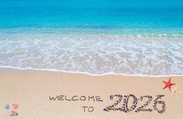 welcome to 2026 written in the sand