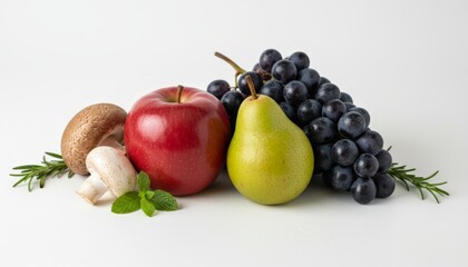 Composition of fresh red apple, green pear, dark grapes, mushrooms, rosemary, and mint leaves on a clean white background, representing healthy eating and organic ingredients