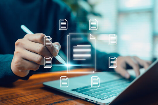 A person using a digital pen to manage and organize electronic documents on a laptop, representing digital file management, cloud documents, workflow organization, and modern online document systems. - Powered by Adobe