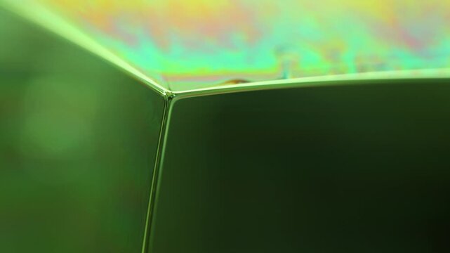 Green liquid surface, phenomenal structure, green oils on a dark background, colourful luminous abstract, surrealistic art, line of light, glowing effects