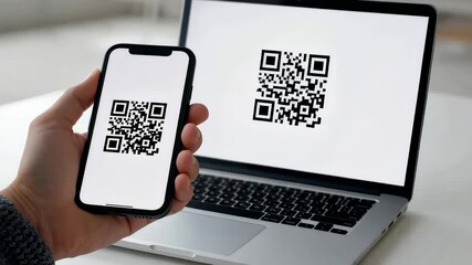 Hand holding smartphone displaying QR code in front of laptop screen showing matching digital code for modern scanning and secure access use - Powered by Adobe