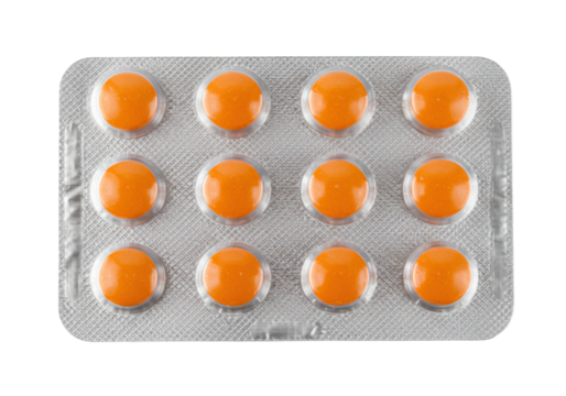 Isolated orange tablets in blister pack for pharmaceutical health care treatment use